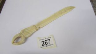 An antique ivory letter opener.