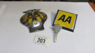 Two vintage AA badges and an AA key.