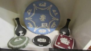 A mixed lot of Wedgwood Jasper ware in various colours.