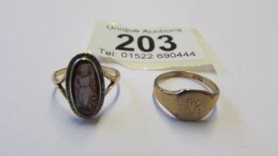 A 9ct gold oval cameo ring and a 9ct gold signet ring, both size L.