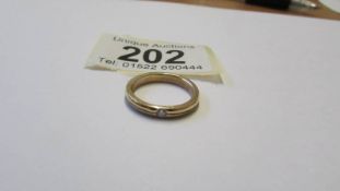 A 9ct gold (tested) diamond solitaire ring, 3 grams, size L.