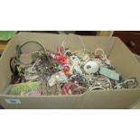 A large box of costume jewellery.