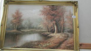 A gilt framed oil on canvas woodland scene, COLLECT ONLY.