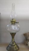 A brass and glass oil lamp with chimney, COLLECT ONLY.