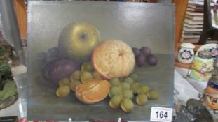 A small still life on board of fruit.