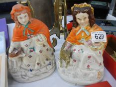 A pair Staffordshire figures.