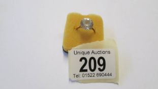 A 9ct gold ring set large clear stone, size N.