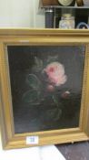 A good framed oil on board study of a single rose.