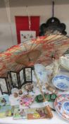 A mixed lot of oriental items including ceramics, parasol etc., COLLECT ONLY.