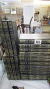 A collection of 20 Alastair Maclean Blue Heron faux leather and gilt hardback books.
