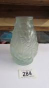 A French Lalique style glass vase, 13 cm.