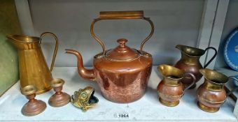 Victorian Copper kettle, copper and brass jugs, candlesticks and spoon warmer in the shape of a fish