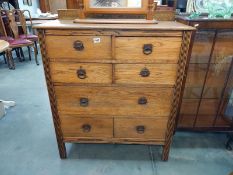 An Edwardian oak seven drawer chest with iron handles. 95cm x 45cm x height 110cm. COLLECT ONLY