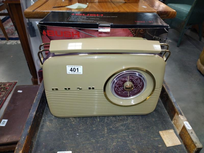A boxed reproduction Bush TR82/97 radio.
