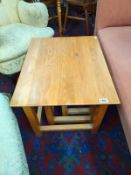 An oak nest of three tables. Large table 67cm x 53cm x 46cm. COLLECT ONLY.