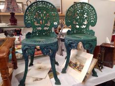 A pair of weathered green aluminium garden chairs, COLLECT ONLY.
