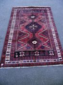 A Middle Eastern Aztec style patterned run. Length 265cm x 177cm. COLLECT ONLY.