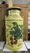 A painted milk churn decorated with grapes and peaches, COLLECT ONLY.