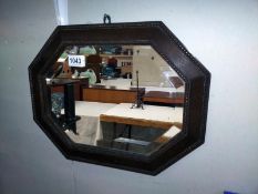 A wood framed mirror. COLLECT ONLY.