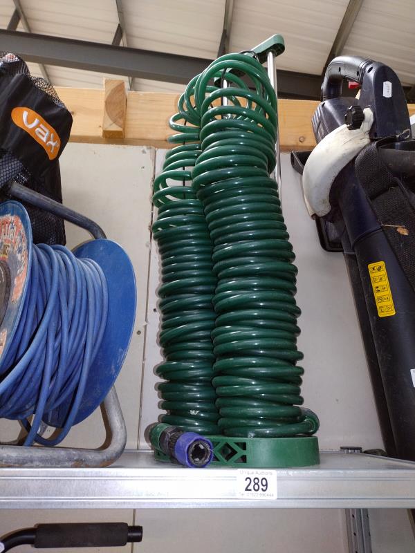 A garden hose, COLLECT ONLY.