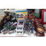 A good selection of EFE diecast buses, Yesteryear vans and Matchbox G-5 gift set