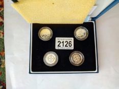A UK silver proof cased set of Â£1 coins 1999 - 2002