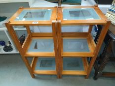 A pair of pine 3 tier shelf units with glass shelves. 30cm x 35cm x 79cm.