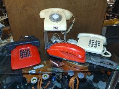 Four vintage telephones