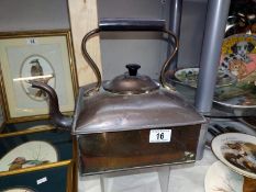 An unusual square copper kettle