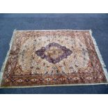 A Persian style rug. Length 273 cm x 182 cm. COLLECT ONLY.