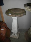 A large concrete pot stand, 80 cm tall, top 45cm diameter, COLLECT ONLY.
