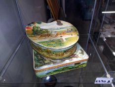 A circa 1900 Huntley and Palmer artist palette biscuit tin and one other.