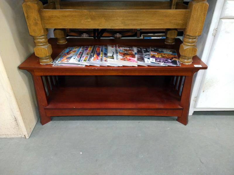 A retro mahogany effect coffee table. 107cm x 56cm x 46cm. COLLECT ONLY.