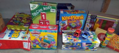 A quantity of toys & games including Ker Plunk, tin can alley & Mega Bloks etc.