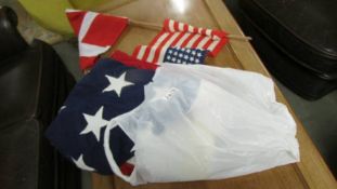 A large USA flag and one other.