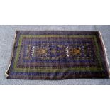 A Turkish/ Aztec style pattern rug. Length 210cm x 113cm. COLLECT ONLY.