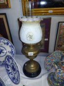 A Victorian brass oil lamp with later shade, COLLECT ONLY.