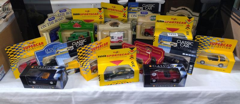 A mixed lot of boxed Diecast vehicles including Days Gone, Maisto, Classic Cars etc.,