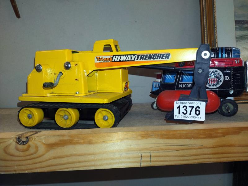 A Japanese tinplate battery operated helicopter A/F and a Triang Hi-Way trencher - Image 2 of 3