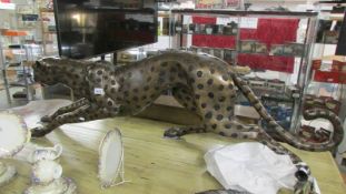 A large brass Cheetah, 162 cm long, 48 cm high, COLLECT ONLY.