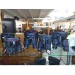 Five pairs of binoculars including Prinzlux 7X50, Pathescope 8X40, Philo 10X50, Rutland 8X40 and