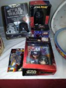 A quantity of vintage Star Wars items all in packaging, includes walkie talkies, alarm clock etc