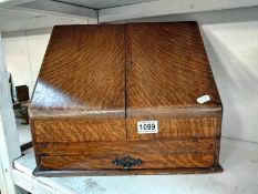 A Victorian/ Edwardian oak writing box. COLLECT ONLY.