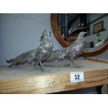 A pair of silver plated pheasants