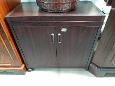 A mahogany effect hostess tea trolley. COLLECT ONLY.