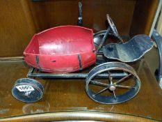 A novelty pressed steel tractor garden planter. COLLECT ONLY.