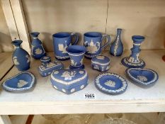 A good selection of Blue Wedgewood Jasper ware including tankards, vases etc.