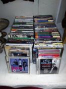 A quantity of DVD's & CD's including Paul Weller etc.
