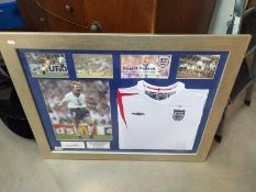 A framed Stuart Pearce/England shirt, signed. COLLECT ONLY.