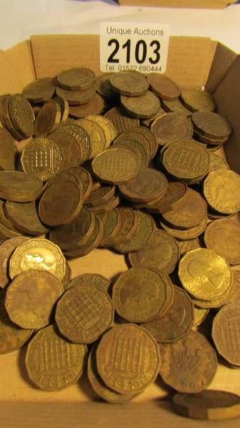 A quantity of old threepenny bits.